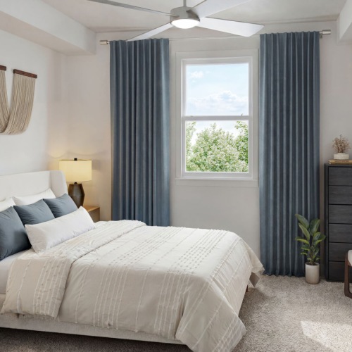 Bedroom with natural lighting and high ceilings