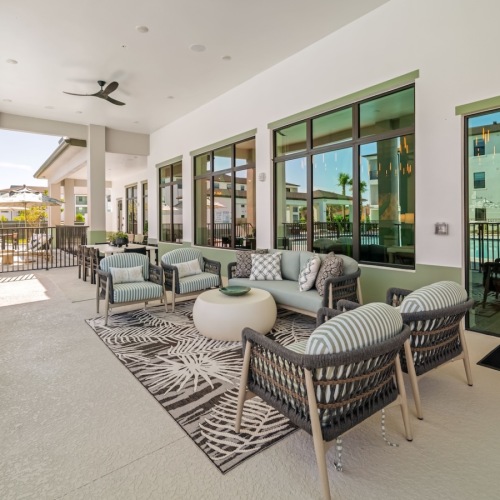 large resident patio with couch chairs and coffee table