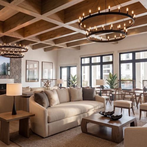 a lounge with sofas and a large fireplace and tv